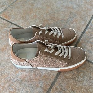 Rose gold glitter dolce vita sneakers.
